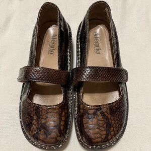 - Alegria Mary Jane Brown Snake Print Shoes